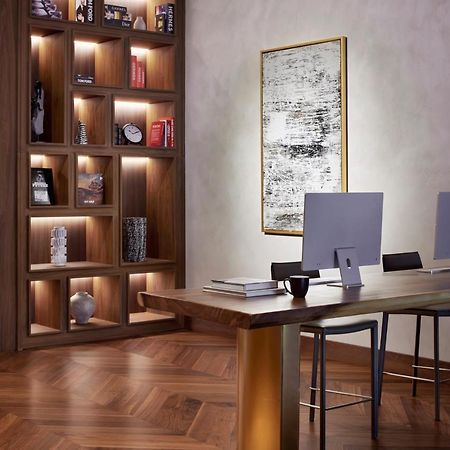 Movenpick Jumeirah Village Triangle Dubaj Kültér fotó The library at the hotel